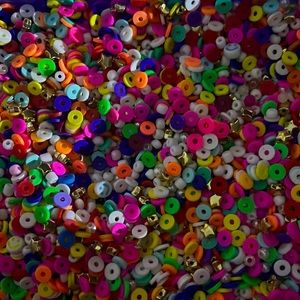 1 scoop of this bead mix. If you get a blue clay evil eye charm, free bracelet!!